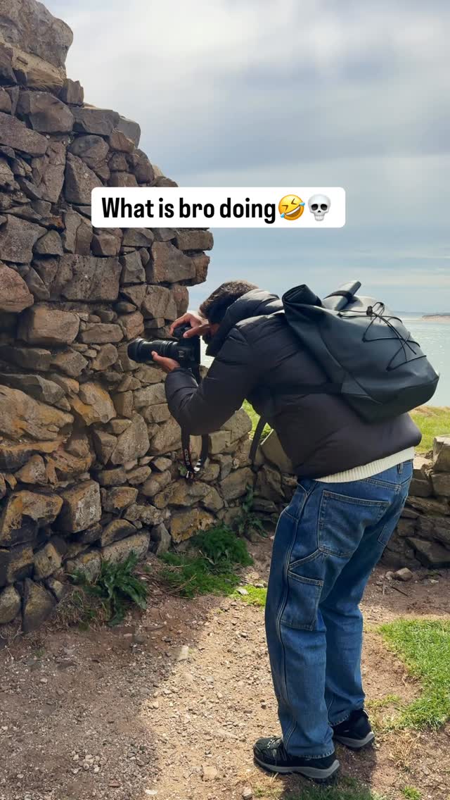 What is bro doing? 🤯🤣

Turns out he found a hidden photo spot on Holy Island. 🏰 There’s a small opening in the wall at Osborne’s Fort, and if you line it up right, you get a perfect view of Lindisfarne Castle.

Holy Island, also known as Lindisfarne, is a tidal island off the coast of Northumberland in northeast England.

How to reach from Newcastle upon Tyne:

• Drive, about 1.5 hours via A1, then cross the causeway at low tide
• Train to Berwick-upon-Tweed, then taxi or bus to the island
• Always check tide times, the road goes underwater at high tide

Save this for your Holy Island trip 🫶🏻

#holyisland #lindisfarne #northumberland #uktravel #uktravels